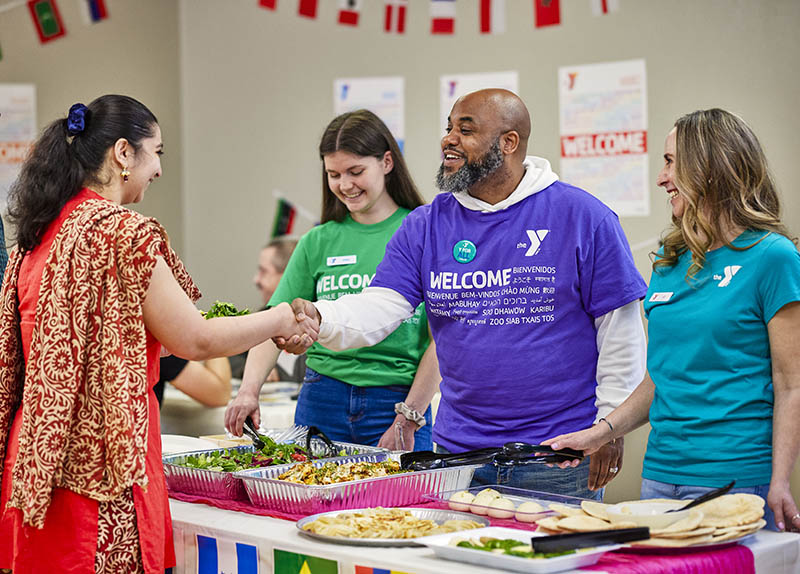 YMCA Staff Welcoming Member 